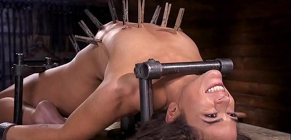  Slave is on her back in device bondage